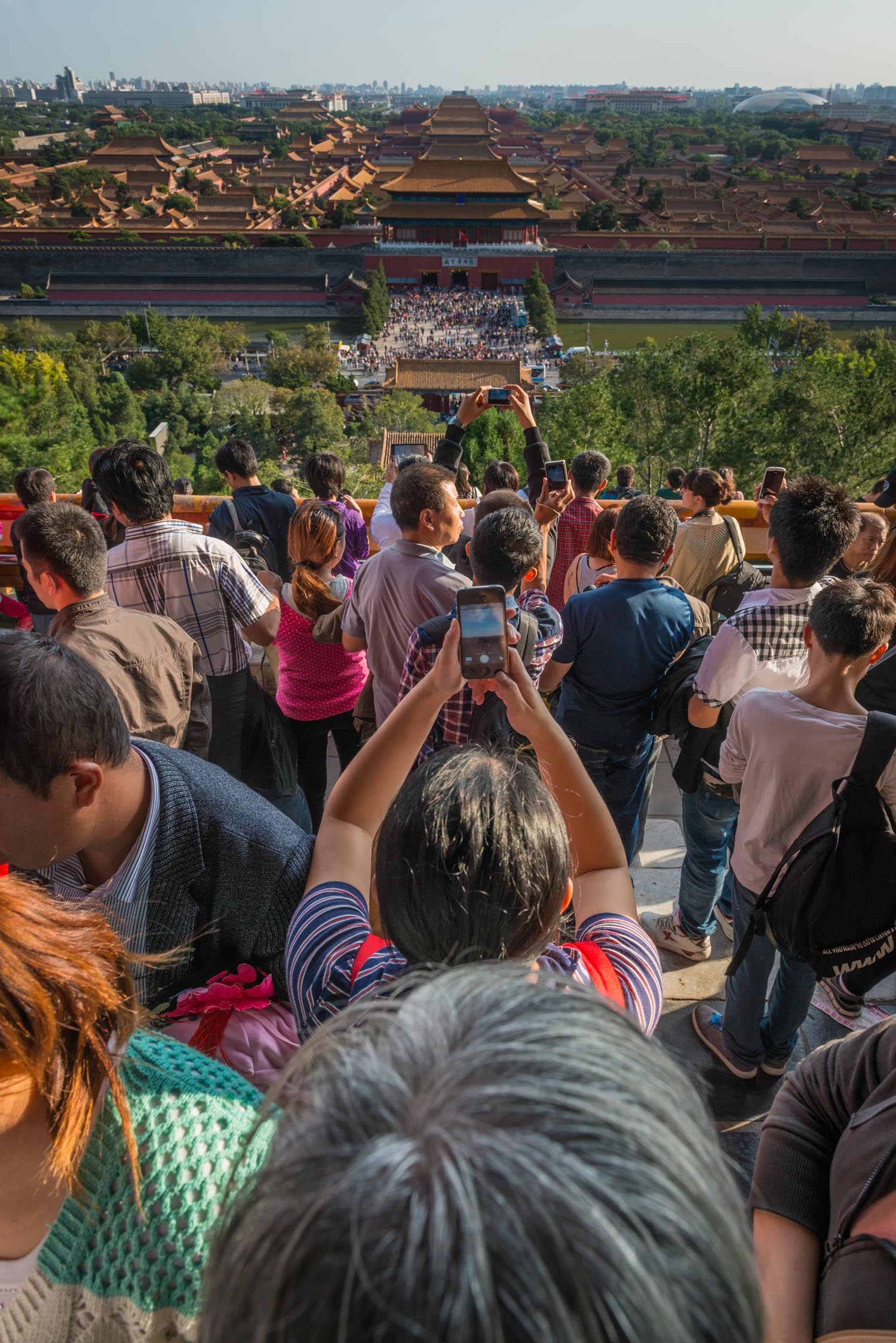 Beijing tourist crowds photographing the Forbidden City with cellphones China