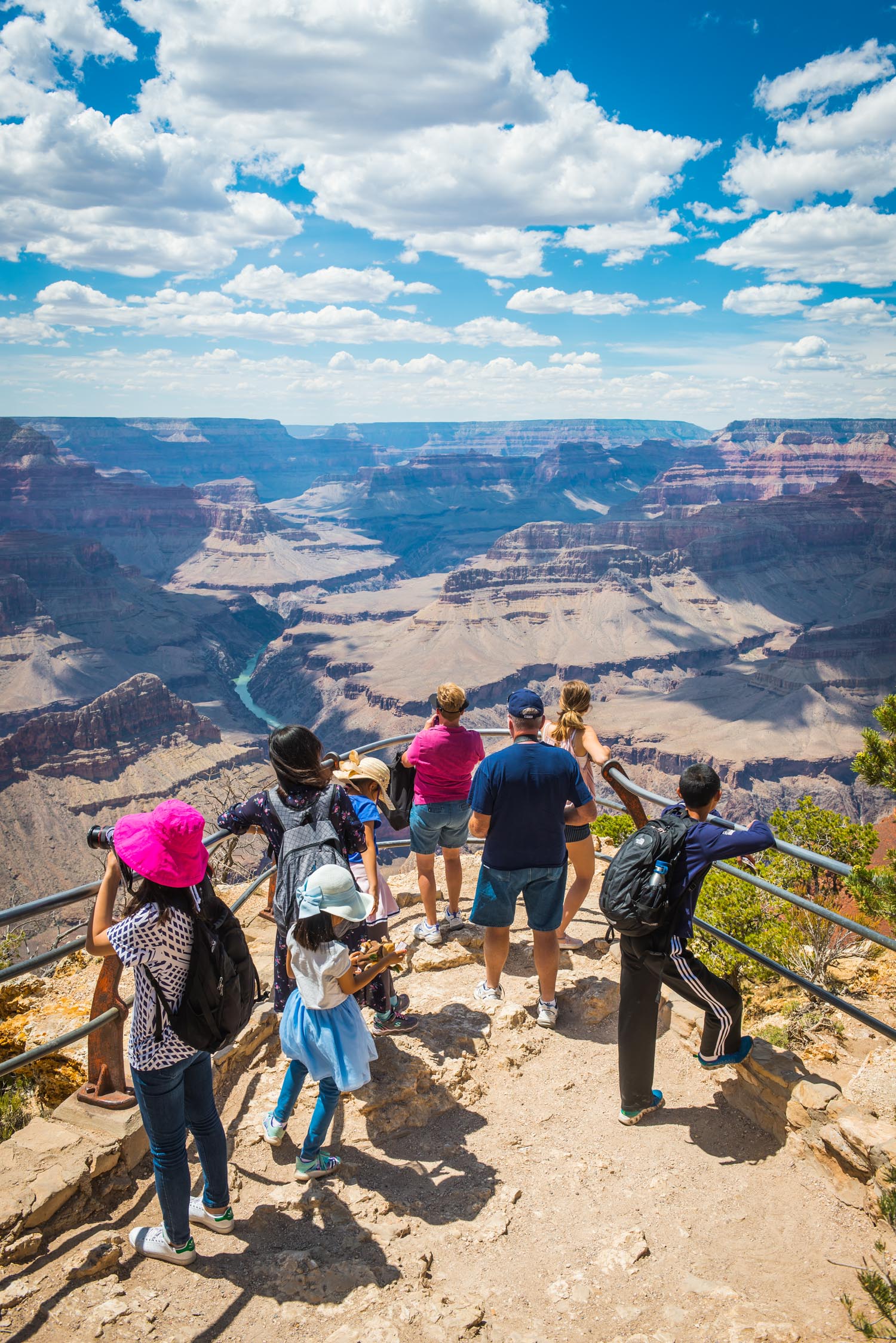 Grand Canyon tourists on Mohave Point overlooking Colorado Arizona